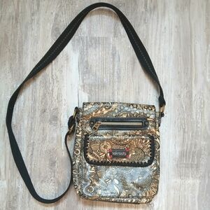 Sakroots Artist Circle Crossbody Bag – Cream & Black Floral Print – Adjustable